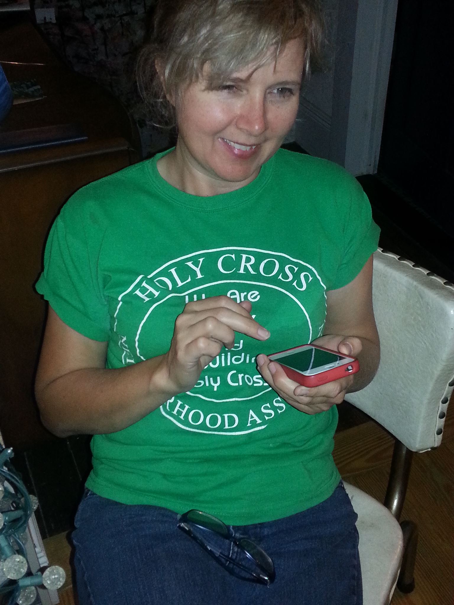 Gina wearing Holy Cross Neighborhood shirt