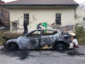 Burned Altima on Alhambra Street.